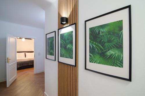 En eller flere senge i et værelse på Slotvin Apartments