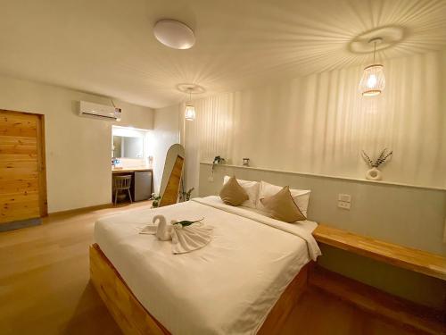 Postel nebo postele na pokoji v ubytování The O room