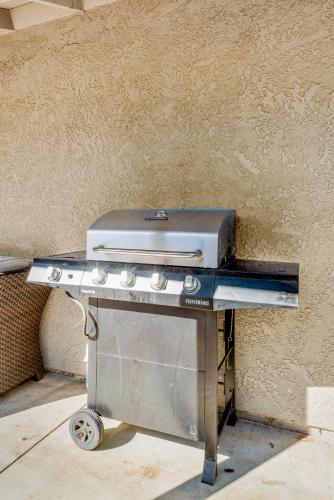 a grill sitting on a table next to a wall at Gated 6beds 2garage home near Disney other LA attraction in Chino