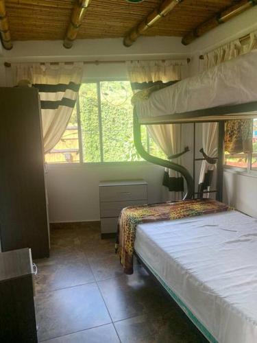 Una cama o camas en una habitación de Finca Leito