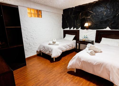 KW HOTELにあるベッド