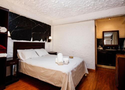 KW HOTELにあるベッド