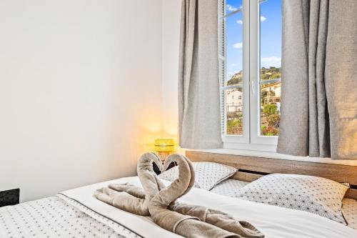 Postel nebo postele na pokoji v ubytování Frontière Monaco - Splendide 2 pièces - Vue Mer