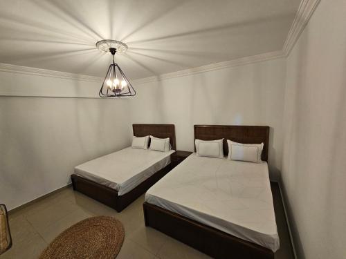 Katil atau katil-katil dalam bilik di Welcome sea view - families only