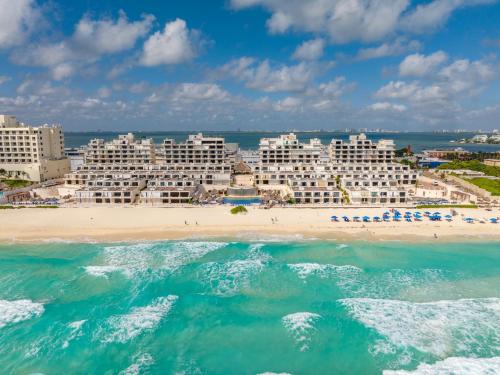an aerial view of a beach and buildings at Beachfront Villa in Cancun Hotel Zone in Cancún