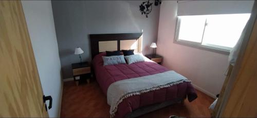 En eller flere senge i et værelse på Apart El Cardenal Chapadmalal MDQ