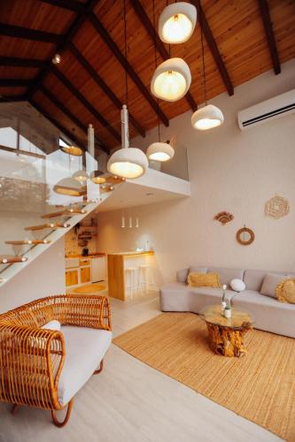 a living room with a couch and a table at DD's Roof Villas in Ardeşen