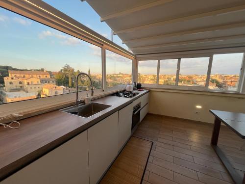 Roma Attico panoramico Whitecate