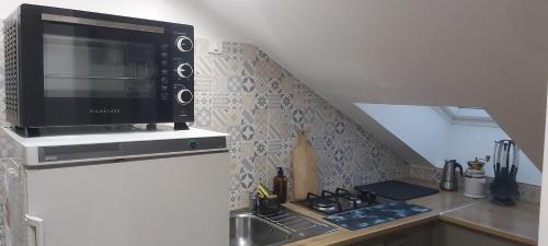 Η κουζίνα ή μικρή κουζίνα στο Les Suite Appartement à Chalon sur Saône