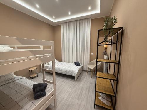 Postel nebo postele na pokoji v ubytování Appartamento Cadore