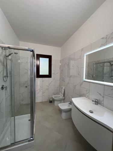Koupelna v ubytování Eraldo Rooms