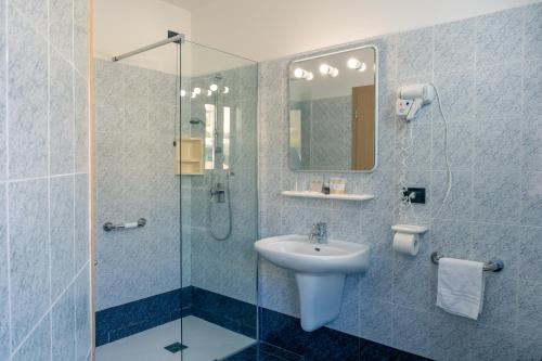 Koupelna v ubytování Hotel Irma