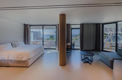 Ένα ή περισσότερα κρεβάτια σε δωμάτιο στο Zins Luxury Rooms