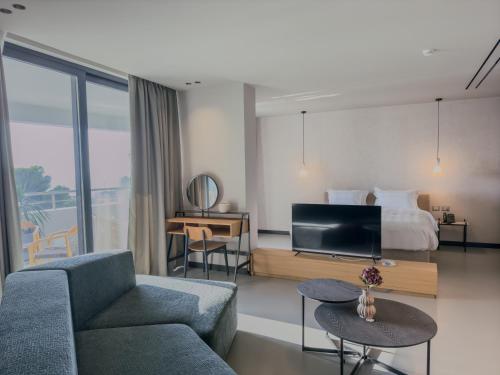 Μια τηλεόραση ή/και κέντρο ψυχαγωγίας στο Zins Luxury Rooms
