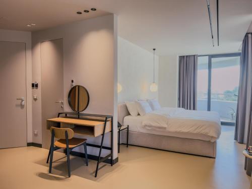 Ένα ή περισσότερα κρεβάτια σε δωμάτιο στο Zins Luxury Rooms
