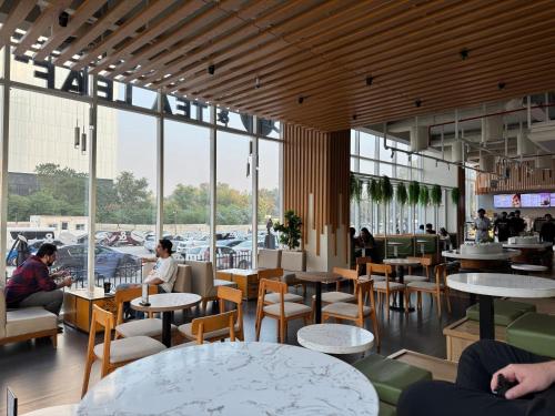 Εστιατόριο ή άλλο μέρος για φαγητό στο Elysium Tower Cozy 2Bhk with Netflix & City Views