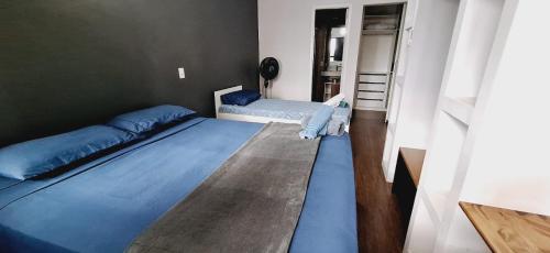 Postel nebo postele na pokoji v ubytování Conjunto Estúdio e Duplex Selenita by Alpha-StayService