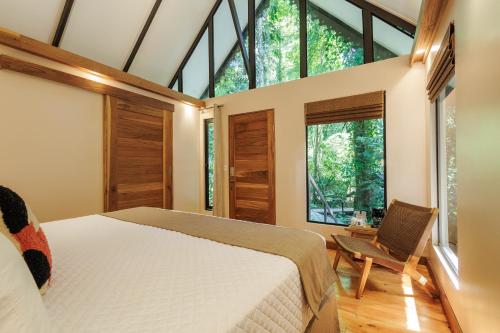 Ein Bett oder Betten in einem Zimmer der Unterkunft Almonds & Corals Boutique Hotel