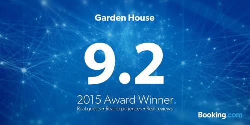 a poster for a garden house with the words award winner at Flat 2 - Entire Modern Two Bedrooms home with en-suite & free parking close to QMC, City centre and Notts uni - Self check in in Nottingham