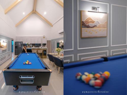 a billiard room with a pool table in a room at The Family at Khaoyai in Wangkata