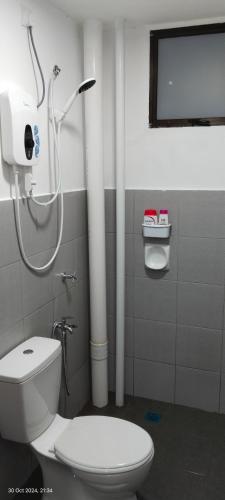 Koupelna v ubytování Nana Homestay