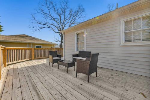 a patio with chairs and a table on a house at Charming 3-bedroom Home -Quiet East Atlanta Neighborhood in Atlanta