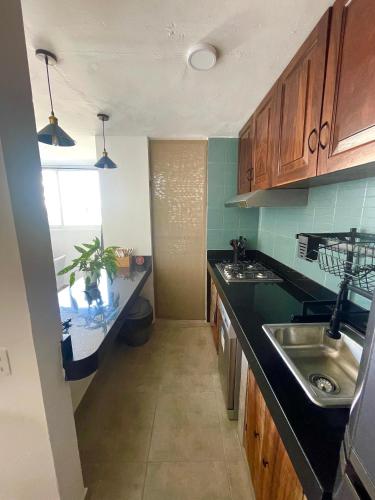 a kitchen with a sink and a counter top at Great condo in the best location in Puerto Vallarta