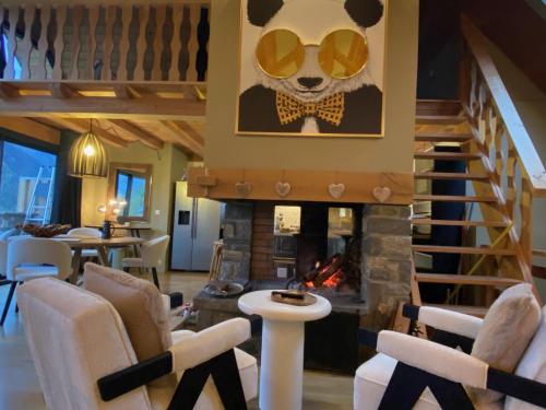 Χώρος καθιστικού στο Chalet de luxe contemporain vue 360 degrés sur les montagnes