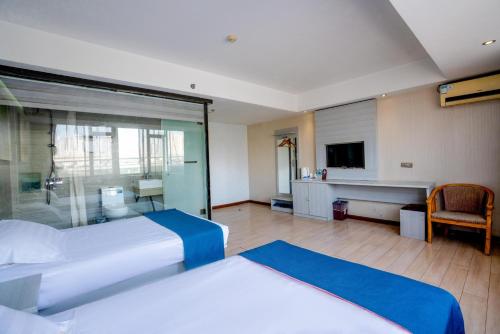 Postel nebo postele na pokoji v ubytování Juli Boutique Hotel