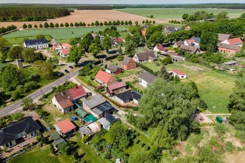an aerial view of a residential estate at Ferienhaus-Sommerfrische-am-Mueritzsee in Buchholz