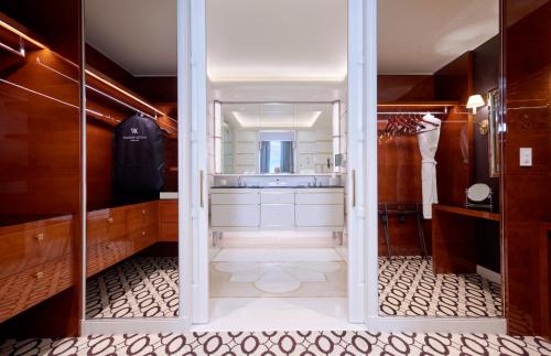 a bathroom with a sink and a mirror at Waldorf Astoria Beverly Hills in Los Angeles