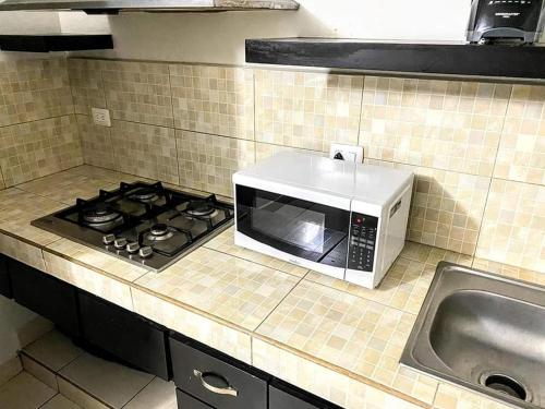 Η κουζίνα ή μικρή κουζίνα στο Departamento Gaviotas