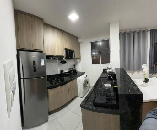 Kuchnia lub aneks kuchenny w obiekcie Apartamento novo e completo próximo Arena Pantanal