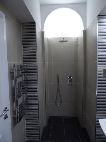 Ванная комната в Court Residence Aparthotel