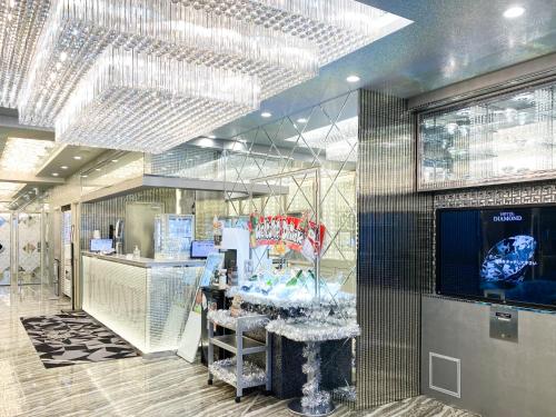 TV a/nebo společenská místnost v ubytování Hotel DIAMOND
