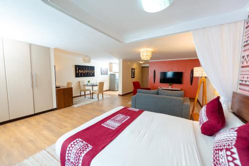 Heri Heights Hotel Apartments, SureStay Collection by Best Westernにあるテレビまたはエンターテインメントセンター
