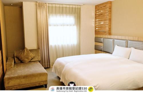 友愛京賞國際大飯店 Yoai Jing Shang Hotelにあるベッド
