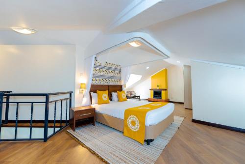 Heri Heights Hotel Apartments, SureStay Collection by Best Westernにあるベッド