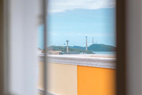 a view of the ocean from a window at HALA Home Phú Quốc in Phu Quoc