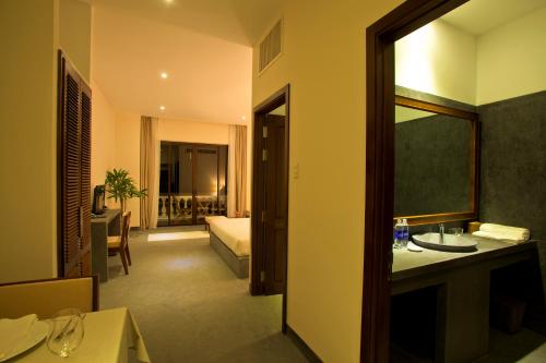 Una cama o camas en una habitación de Palm View Villa