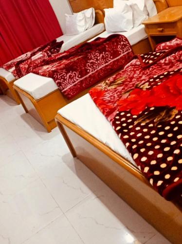 Un ou plusieurs lits dans un hébergement de l'établissement Hotel Al badar