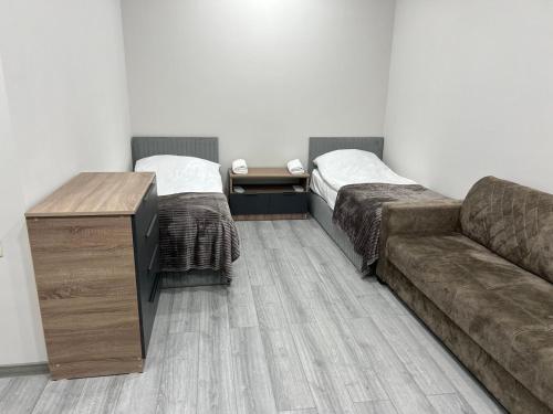 Postel nebo postele na pokoji v ubytování Bank Hotel