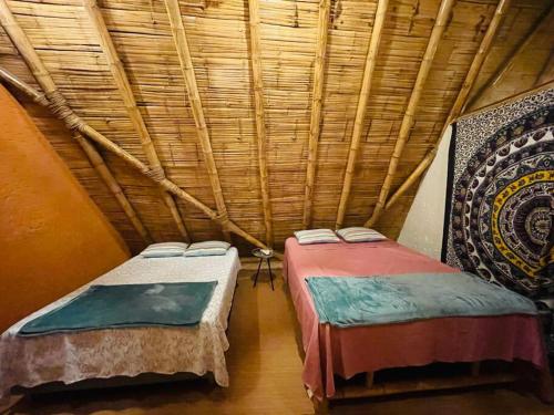 Un encuentro mágico con la naturalezaにあるベッド