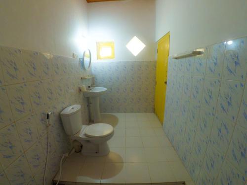 Ванная комната в Surfing Beach Guest House