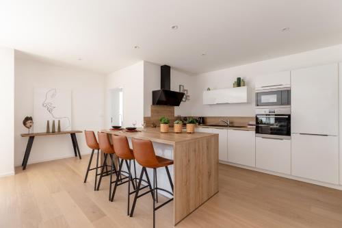Kuchyň nebo kuchyňský kout v ubytování Appartements du comte de Dabo