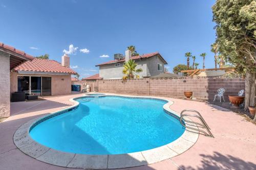 a swimming pool in the backyard of a house at Vacation Home in Vegas w Pool 2 mile to Strip in Las Vegas