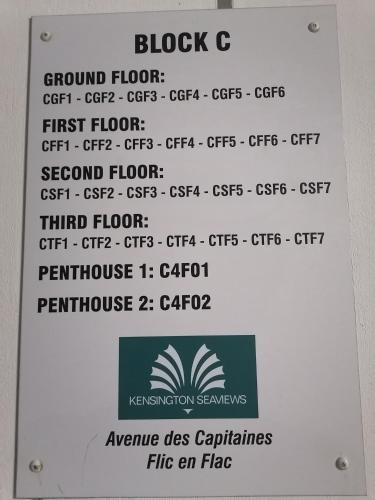 a sign for the floor of a building with the words blockc at Luxury Seaview Apartment Flic en Flac CFF07 in Flic-en-Flac