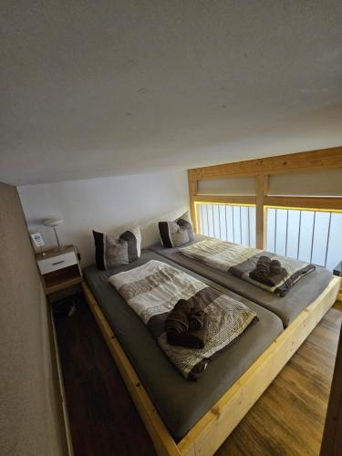 Postel nebo postele na pokoji v ubytování Casa Colori Rheinfelden