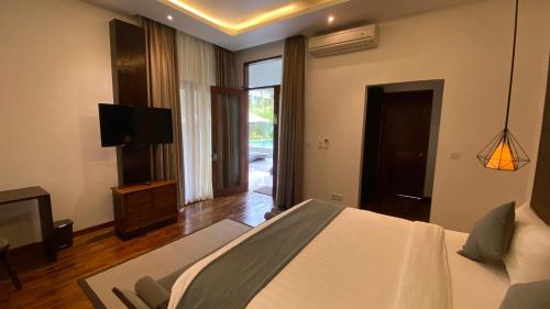 Televisyen dan/atau pusat hiburan di djabu Canggu Beach Villa