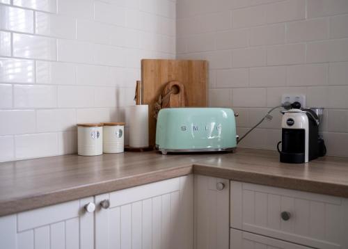 Una cocina o zona de cocina en Nelly's Cottage Braidwood